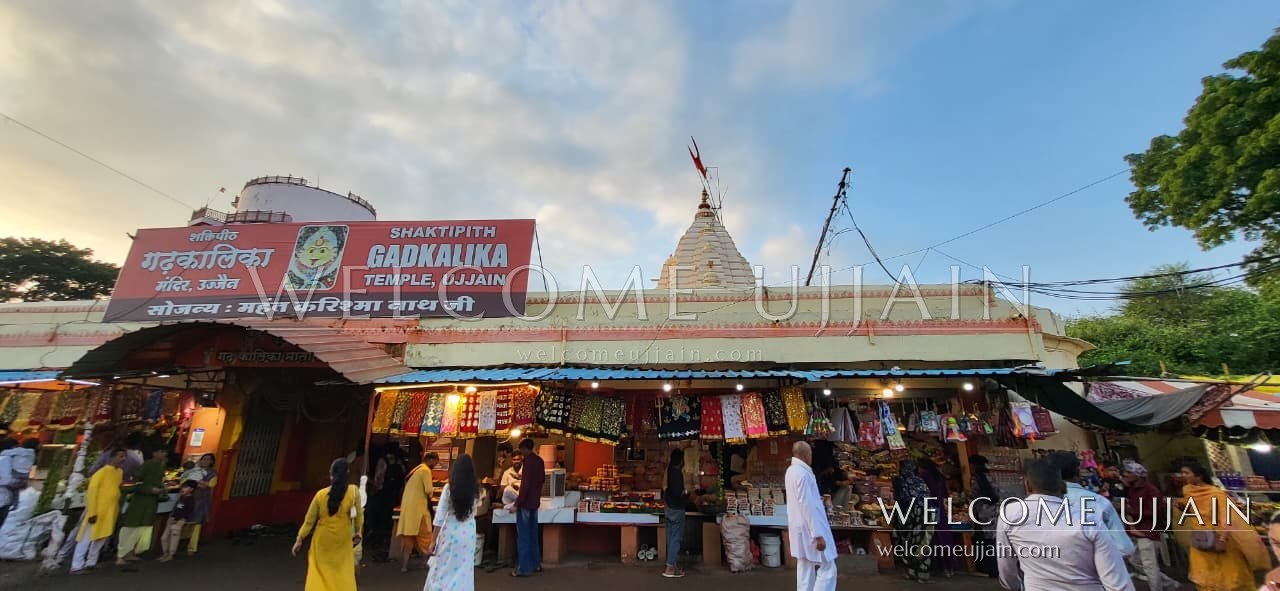 The Gadkalika temple gate and the stalls outside it